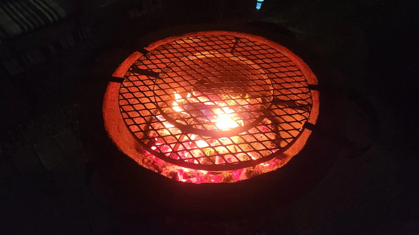 Fire brazier glowing at night