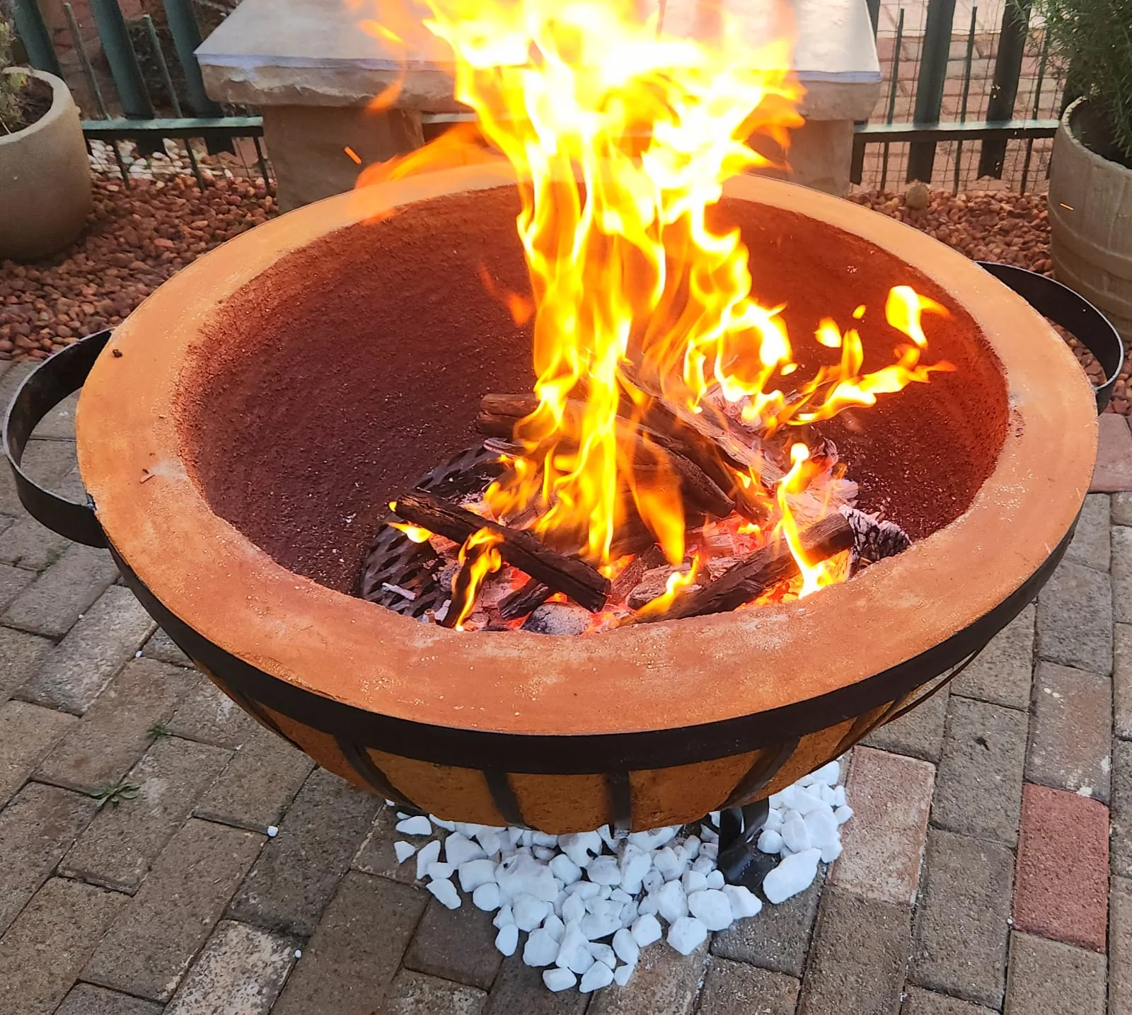 Close-up of flames in braai bowl