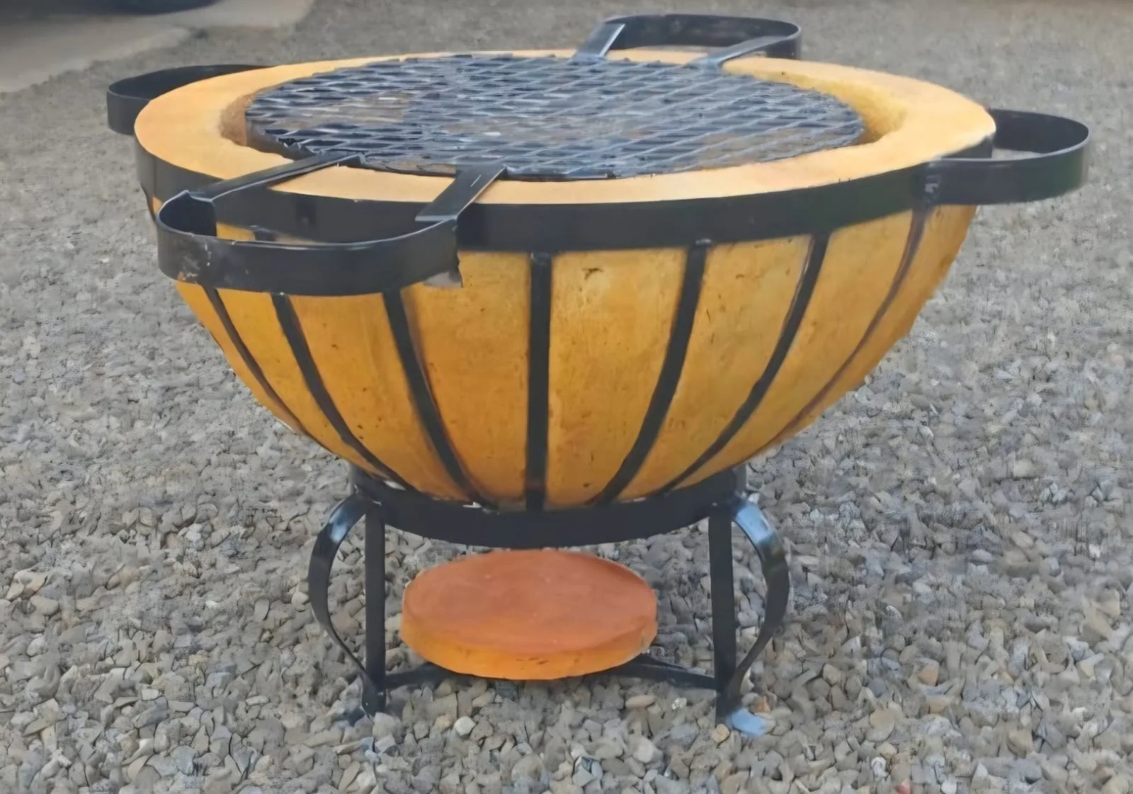 Boma braai with grill on gravel